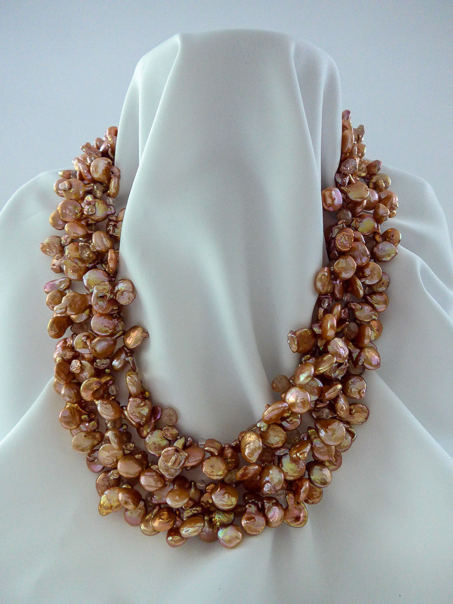 THREE STRAND GRADUATED PEACHY COPPER COIN DROP CULTURED PEARL NECKLACE