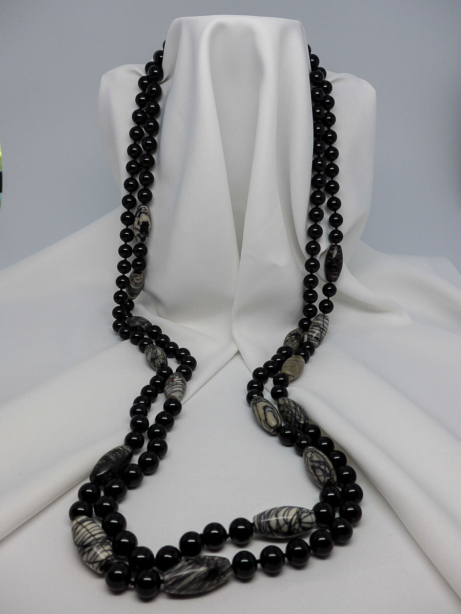 TWO INDIVIDUAL STRANDS ONYX AND ZEBRA JASPER GEMSTONE NECKLACES