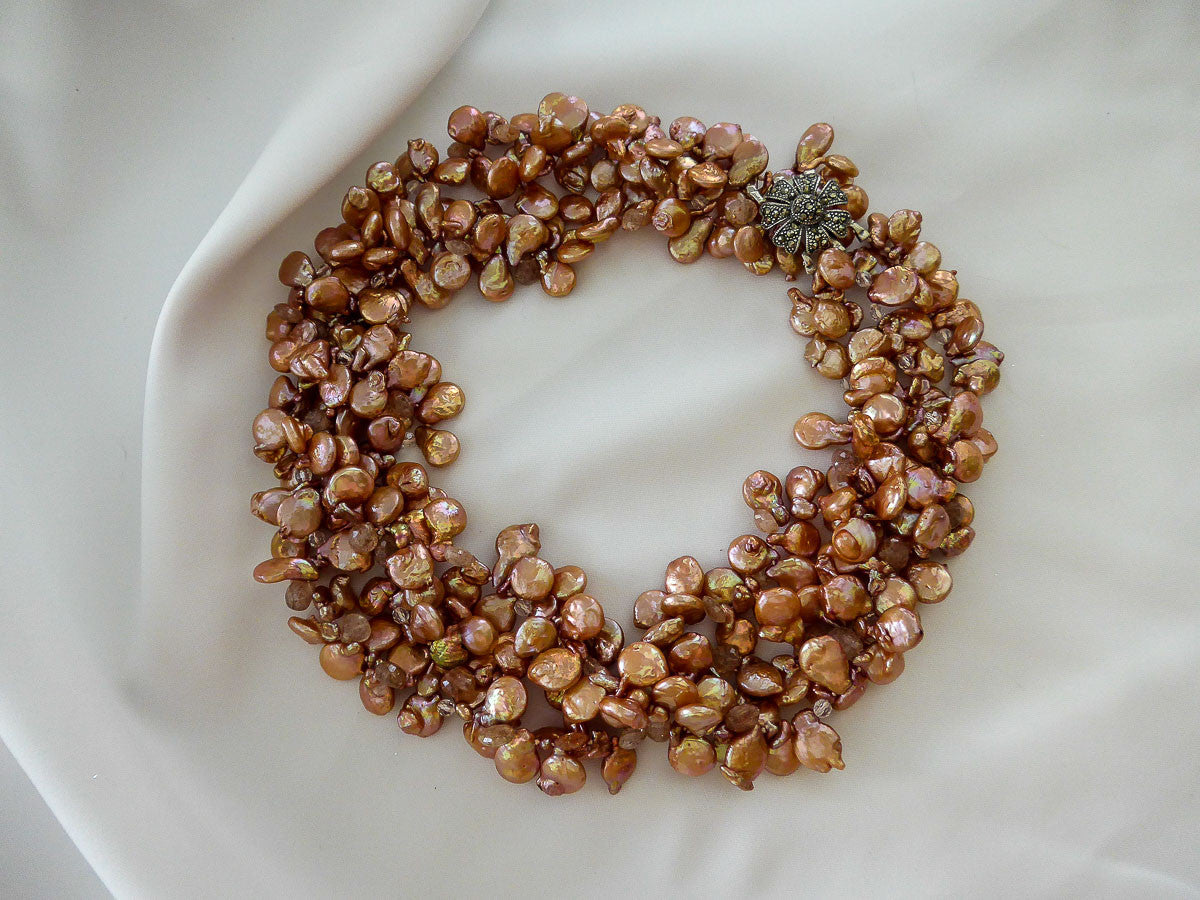 THREE STRAND GRADUATED PEACHY COPPER COIN DROP CULTURED PEARL NECKLACE