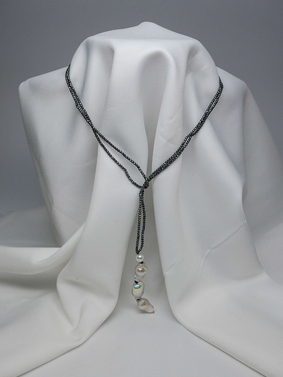 ONE STRAND HEMATITE AND BAROQUE PEARL CLOSED LARIAT NECKLACE