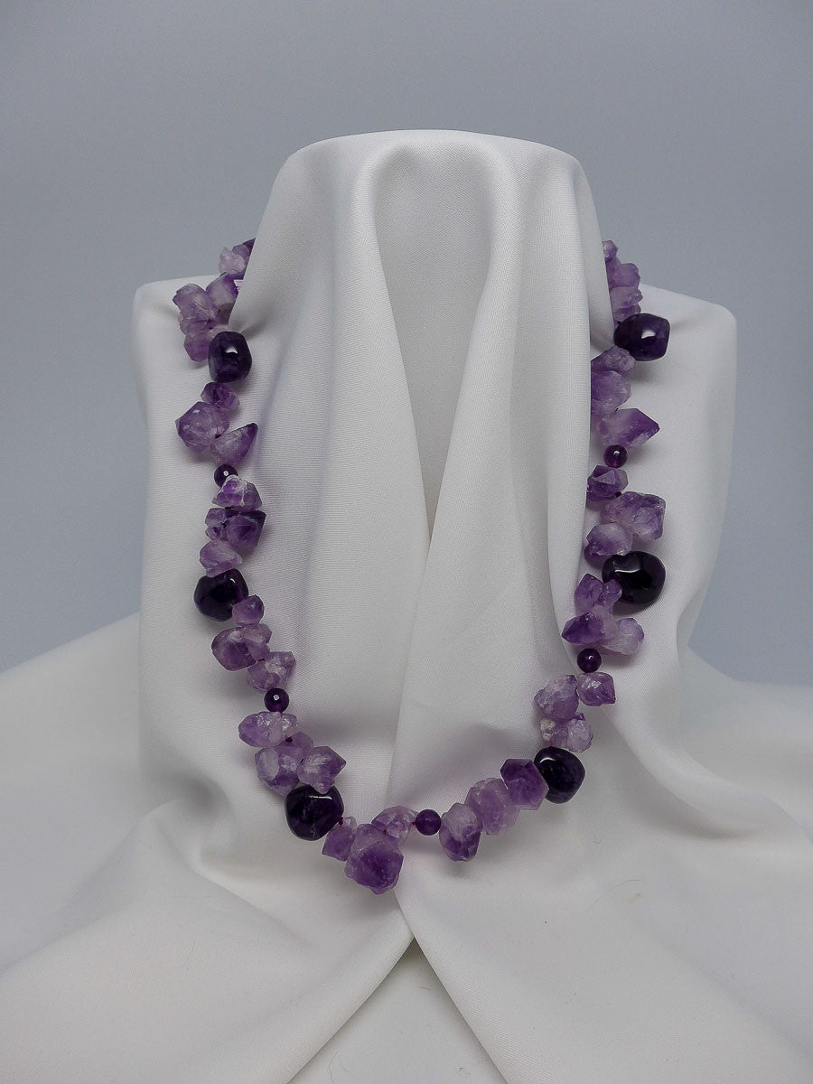 TWO INDIVIDUAL STRAND AMETHYST GEMSTONE NECKLACES