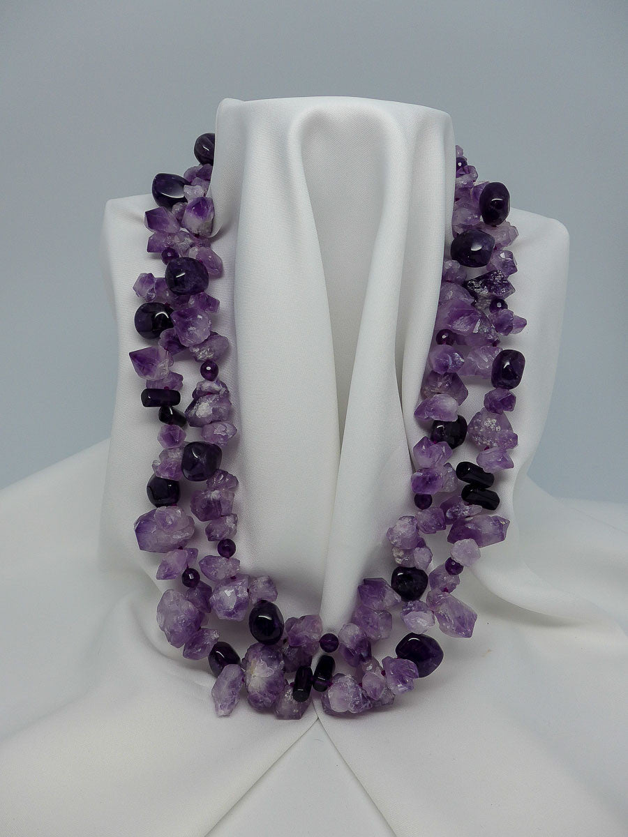 TWO INDIVIDUAL STRAND AMETHYST GEMSTONE NECKLACES