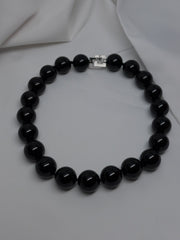 One Strand 20mm Black Onyx with a Sterling Silver Clasp