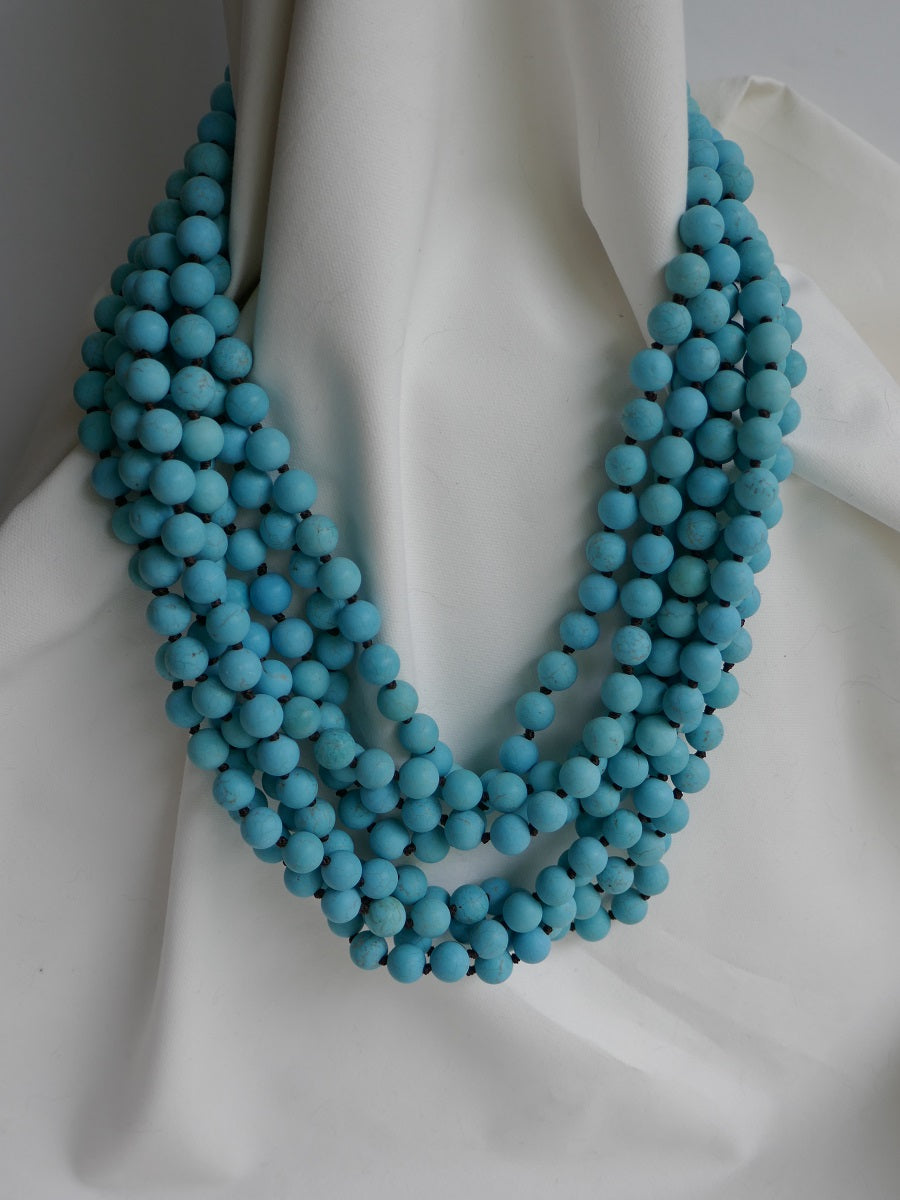 Four Strand Turquoise Color Magnesite Long Gemstone Necklace