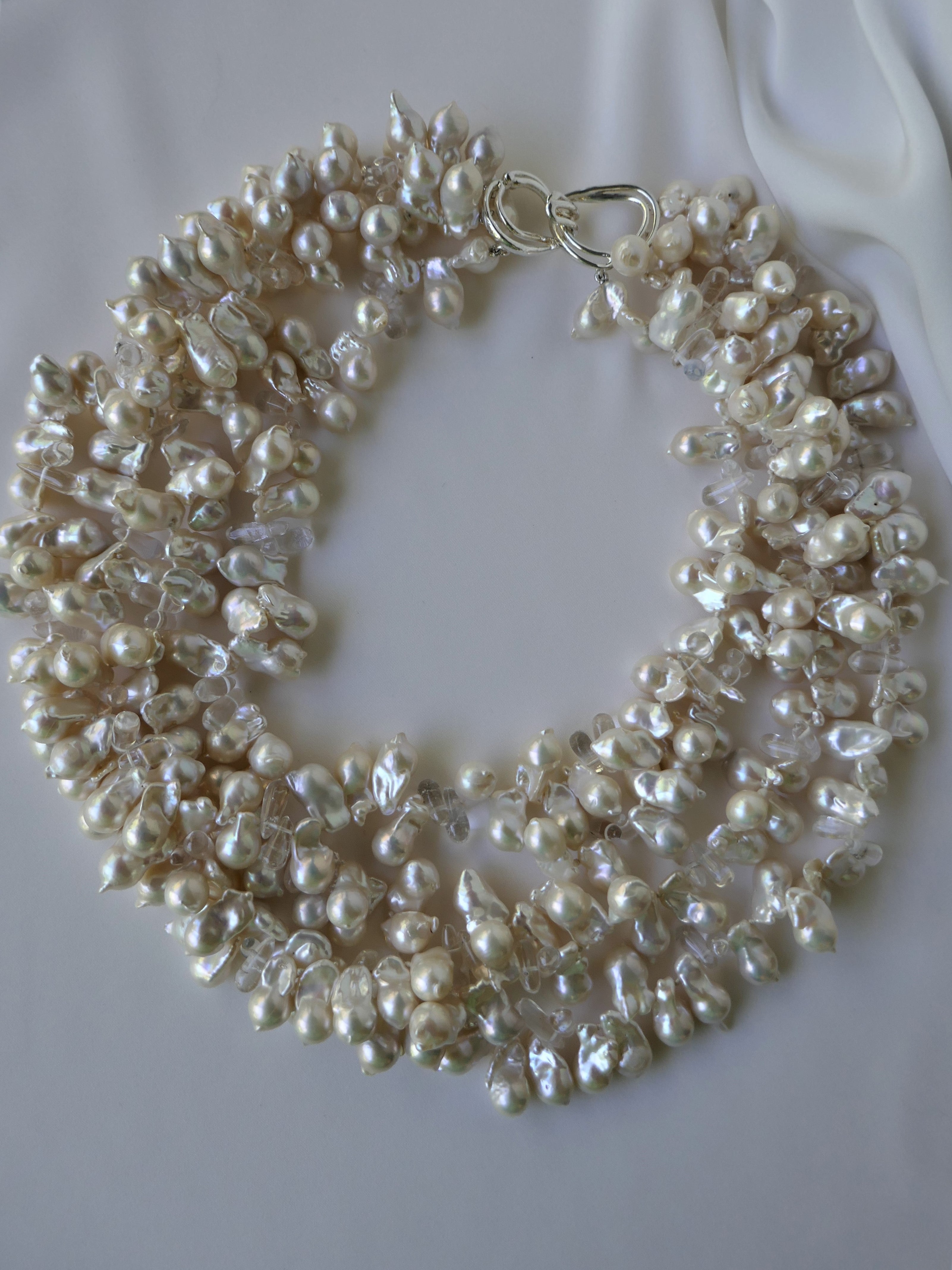 Four Strand Akoya Cultured Pearls and Rock Crystal Briollets Statement Necklace.